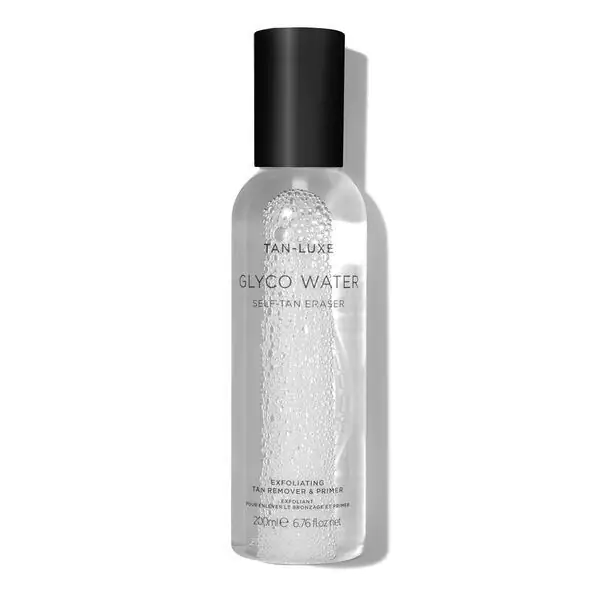 Отшелушивающее средство для удаления загара и грунтовка Tan-Luxe Glyco Water, £22 Отшелушивающее средство для удаления загара и грунтовка Tan-Luxe Glyco Water, £22