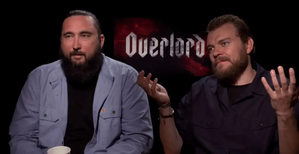[Видеоинтервью] Режиссер «Оверлорда» Джулиус Эйвери и актер Пилу Асбек о надоедливых слухах о «Кловерфилде»