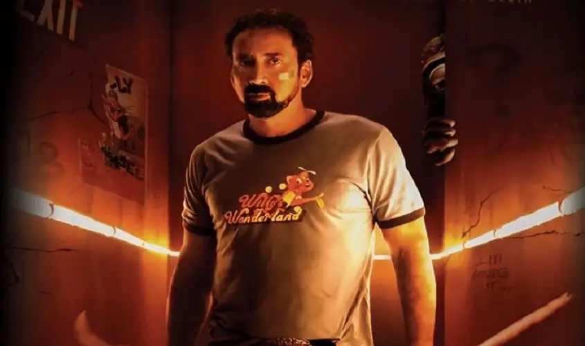 Николас Кейдж готов сразить аниматроников-убийц в этом рекламном арте «Страна чудес Вилли»